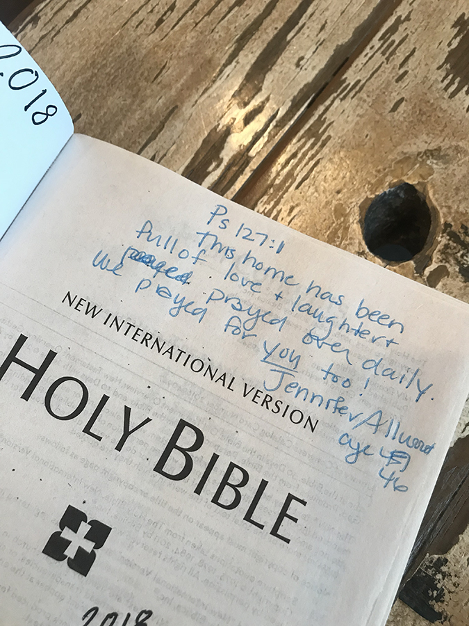 Picture of Bible with a hand-written messages from homeowner
