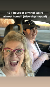Selfie of woman and friend in the car on a road trip