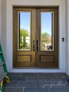 progress photo of gold front door with a faux finish