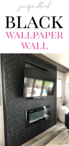 Black wallpaper wall with fireplace insert