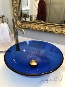 blue bowl sink with gold details