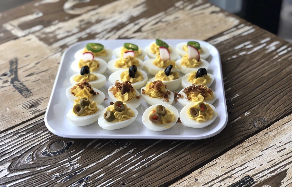 deviled eggs laid out on kitchen table