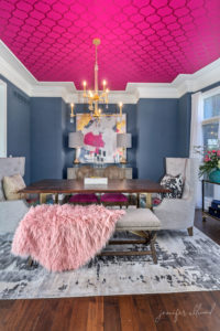 glamorous dining room with pink accents