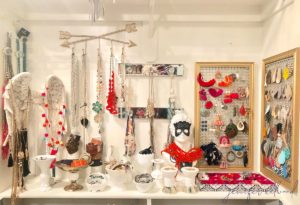 angel wings and other pieces used as jewelry organizers