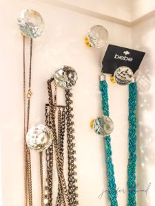 sparkly, glass knobs to hold necklaces